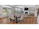 Bright living area with hardwood floors, a modern ceiling fan, and lots of natural light at 87 Rushing View Gln, Dallas, GA 30157