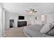 Spacious main bedroom featuring plush carpeting, ceiling fan, and serene atmosphere at 87 Rushing View Gln, Dallas, GA 30157