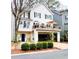 Two story home with a charming front porch and an inviting upper level deck at 2316 Defoors Ferry Nw Rd, Atlanta, GA 30318