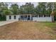 Charming renovated one-story home featuring a freshly painted exterior and well-maintained landscaping at 4176 King Edward Dr, Douglasville, GA 30135