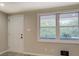 Room features a door, a double window and a black air vent on the wall at 4176 King Edward Dr, Douglasville, GA 30135