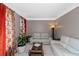Comfortable living room with stylish decor, featuring neutral tones and ample natural light at 5810 Old Mill Trce, Lithonia, GA 30038