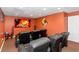 Comfortable media room with tiered seating, ideal for enjoying movies and entertainment at 5810 Old Mill Trce, Lithonia, GA 30038