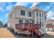 Spacious home exterior with a large deck, ideal for outdoor relaxation and entertainment at 5810 Old Mill Trce, Lithonia, GA 30038