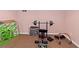 Dedicated workout area equipped with weightlifting equipment, perfect for fitness enthusiasts at 5810 Old Mill Trce, Lithonia, GA 30038