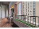 Cozy balcony with views of the city and outdoor seating at 845 Spring Nw St # Ph 5, Atlanta, GA 30308