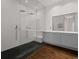 Modern bathroom featuring dual rain shower heads and a sleek vanity at 845 Spring Nw St # Ph 5, Atlanta, GA 30308
