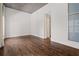 Bright bedroom with hardwood floors, large windows, and neutral color palette at 845 Spring Nw St # Ph 5, Atlanta, GA 30308