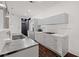 Bright kitchen with stainless steel countertops, marble backsplash, modern cabinetry, and stainless steel appliances at 845 Spring Nw St # Ph 5, Atlanta, GA 30308
