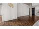 Open-concept living room featuring hardwood floors, exposed concrete ceilings, and lots of natural light at 845 Spring Nw St # Ph 5, Atlanta, GA 30308