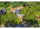 Overhead shot of the property highlighting the 1900 sqft home, mature trees, and surrounding landscape at 4890 Old Briar Trl, Douglasville, GA 30135