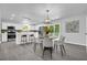 Kitchen and dining area with stainless steel appliances and plenty of seating at 4890 Old Briar Trl, Douglasville, GA 30135