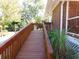 Wooden deck overlooking the landscaped backyard at 893 Andrews Dr, Conyers, GA 30012
