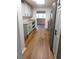 Galley kitchen featuring shaker cabinets, granite countertops, and stainless steel appliances at 893 Andrews Dr, Conyers, GA 30012