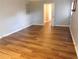 Spacious living room with wood flooring and cozy decor, perfect for entertaining at 893 Andrews Dr, Conyers, GA 30012