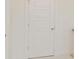 Bright hallway featuring a five-panel door at 6545 Rhett Run, Cumming, GA 30028