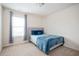 Cozy bedroom with soft carpet, a comfortable bed, and stylish blue accents at 149 Woodhouse Cir, Acworth, GA 30102