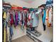 Spacious walk-in closet providing ample storage with shelving and hanging space for clothes at 149 Woodhouse Cir, Acworth, GA 30102