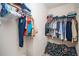 Organized walk-in closet with plenty of hanging space and storage shelves at 149 Woodhouse Cir, Acworth, GA 30102