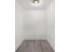 Walk-in closet with light gray floors, crisp white walls, and ample storage space, providing an organized solution at 330 3Rd St # Apt 1, Atlanta, GA 30308