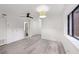 Inviting living room featuring light gray floors, neutral walls, and modern lighting, offering a serene ambiance at 330 3Rd St # Apt 1, Atlanta, GA 30308