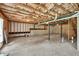 Unfinished basement with concrete floor, utilities and exposed beams at 1530 Avalon Creek Rd, Sugar Hill, GA 30518