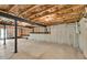 Unfinished basement space with exposed ceiling and concrete floor at 1530 Avalon Creek Rd, Sugar Hill, GA 30518