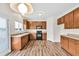 Well-equipped kitchen with stainless steel appliances, hardwood floors, and plenty of cabinet space at 1530 Avalon Creek Rd, Sugar Hill, GA 30518