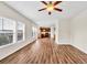 Open floor plan features hardwood floors, lots of windows and adjoins the kitchen at 1530 Avalon Creek Rd, Sugar Hill, GA 30518