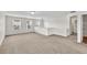 Spacious loft area with neutral carpet, bright lights, a bathroom and several bedrooms at 1530 Avalon Creek Rd, Sugar Hill, GA 30518