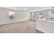 Spacious loft area with neutral carpet, perfect for a playroom or second living area at 1530 Avalon Creek Rd, Sugar Hill, GA 30518