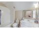 Clean bathroom with tub/shower combination, toilet, and vanity at 3468 Aberrone Pl, Buford, GA 30519