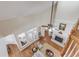 Spacious living room with high ceilings, a fireplace, fan and French doors leading to the exterior at 3468 Aberrone Pl, Buford, GA 30519