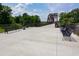 View of the walking bridge with benches and trash cans at 4149 Spring Cove Dr, Duluth, GA 30097