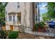 Well-kept townhouse with manicured landscaping and a charming entrance, offering a pleasant first impression at 4149 Spring Cove Dr, Duluth, GA 30097