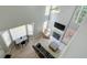 Spacious living room with tall ceilings, lots of windows, and a fireplace at 4149 Spring Cove Dr, Duluth, GA 30097