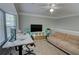 Comfortable living room featuring a plush sofa, modern decor, and ample natural light at 4149 Spring Cove Dr, Duluth, GA 30097