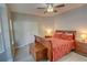 Bedroom with a ceiling fan and a sleigh bed and matching dressers at 4149 Spring Cove Dr, Duluth, GA 30097