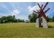 View of park with a sculpture and a bridge in the distance at 4149 Spring Cove Dr, Duluth, GA 30097