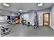 Gym featuring weight machines, free weights and mirrored wall at 795 Hammond Dr # 1108, Atlanta, GA 30328