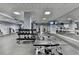 Spacious gym with weights, weight machines, tvs and mirrors at 795 Hammond Dr # 1108, Atlanta, GA 30328