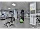 Gym with weight machines, mirror and workout posters at 795 Hammond Dr # 1108, Atlanta, GA 30328