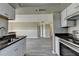 Open kitchen featuring granite countertops and stainless steel appliances at 795 Hammond Dr # 1108, Atlanta, GA 30328