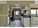 Modern kitchen featuring stainless steel appliances, granite countertops and white cabinets at 795 Hammond Dr # 1108, Atlanta, GA 30328