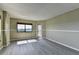 Bright Living room features gray tone flooring, neutral color walls and natural light at 795 Hammond Dr # 1108, Atlanta, GA 30328