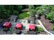 Aerial view of outdoor lounge area with cabanas, fire pit and grill at 795 Hammond Dr # 1108, Atlanta, GA 30328