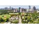 Aerial view of property with Piedmont Park and Atlanta skyline at 1230 Piedmont Ne Ave # 405, Atlanta, GA 30309