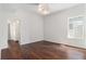 Bright bedroom featuring hardwood floors, large window and an open door to the closet at 1230 Piedmont Ne Ave # 405, Atlanta, GA 30309