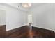 Bedroom featuring dark hardwood floors and neutral color scheme at 1230 Piedmont Ne Ave # 405, Atlanta, GA 30309