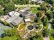 Aerial view of the lush Botanical Gardens, featuring diverse plant collections, water features, and architectural glass buildings at 1230 Piedmont Ne Ave # 405, Atlanta, GA 30309